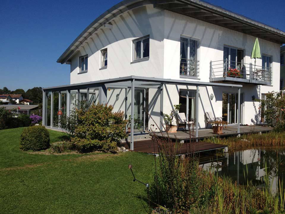 Terrasse mit Glasüberdachung und Wintergarten von Stefan Lutz Überdachungen